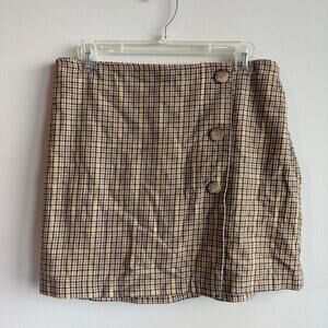 Brown tan black and yellow mini plaid skirt with size buttons and elastic back